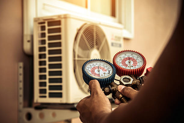 Professional Air Conditioning Service technician working in Brookport, IL
